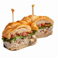 Chicken Salad Sandwich · Chicken salad made fresh daily with all white meat chicken, seedless red grapes, celery, and...