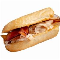 White Bbq Chicken Sandwich · Oven-roasted chicken with hardwood-smoked bacon, smothered with our own white BBQ sauce and ...