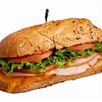 Smoked Turkey · Piles of delicious thinly sliced tender smoked turkey breast on your choice of bread with an...
