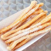 14 Long Sugary Churros · Delicious churros fresh made with exclusive Spanish recipe.