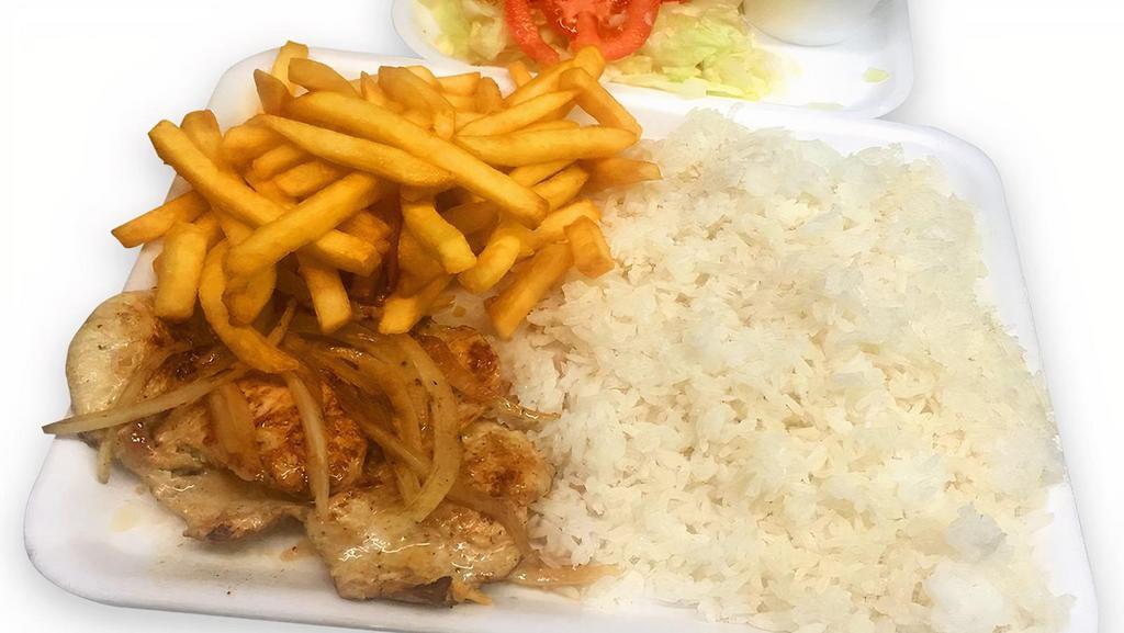 Pechuga De Pollo (Chicken Breast) · Grilled chicken breast with topped grilled onions with a bed of white rice and black beans or a large salad of lettuce and tomatoes salad+sweet plantains or plantain or French fries.