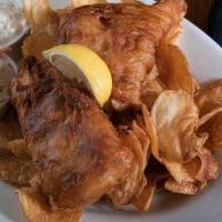 Fish And Chips · Two pieces of hand-cut Atlantic Cod filet hand-dipped in our Smithwick's beer batter. Served...