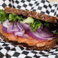Salmon Sandwich · Smoked salmon, arugula, red onion and house sauce.