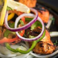 Chicken Tikka · It is traditionally small pieces of boneless chicken baked using skewers in tandoor(clay ove...