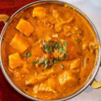 Paneer Butter Masala · Homemade cottage cheese cubes, bell pepper, onion & tomatoes cooked in kadai with chef’s spe...
