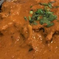 Goat Tikka Masala · Tender pieces of goat (with bone), bell pepper, onion cooked in a hot and spicy tomato based...