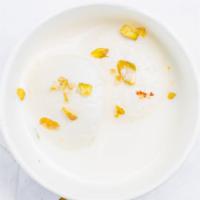 Rasmalai (2 Pc) · Ras Malai is dumplings made from cottage or ricotta cheese soaked in sweetened, thickened mi...