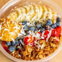 Berry Awesome · Acai with granola, peanut butter, coconut flakes, honey, banana, strawberries, blueberries, ...