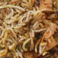 Fish Biryani · Basmati rice cooked with fish, herbs, and spices fragranced with saffron.