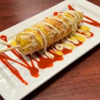 Elotes · corn on the cob    mayo, fresh cheese,butter and chile power