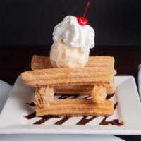 Churros · Fried dough pastry mixed in sugar and cinnamon. Served with Ice Cream