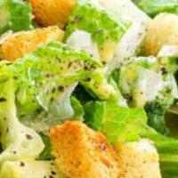 Caesar · Served with romaine lettuce, croutons, Parmesan, bacon.
