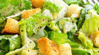 Caesar · Served with romaine lettuce, croutons, Parmesan, bacon.