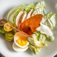 Caffe Cobb · Served with grilled chicken, avocado, prosciutto, tomato, egg, avocado and lime dressing.