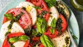 Caprese · Served with soft mozzarella, fresh tomatoes, red onion, olive and balsamic.
