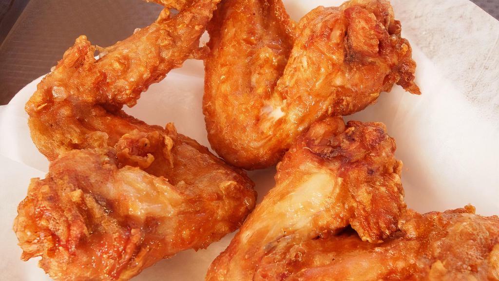 Fried Chicken Wings · Choose 4 pieces or 8 pieces. Comes with fried rice or French fries.