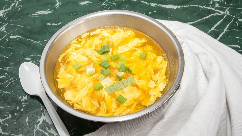 Egg Drop Soup · Comes with a bag of fried wonton strips on the side.