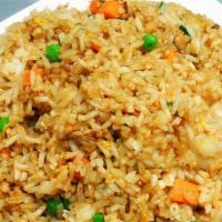 Shrimp Fried Rice · Includes peas, carrots, onion, and eggs.