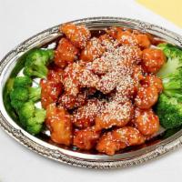 Sesame Chicken · Served with steamed white rice or fried rice and spring roll. Choose any substitution below.
