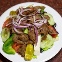 Greek Salad · Mixed Lettuce, Tomatoes, Green Peppers, Onions, Greek Olives, Pepperoncini, Cucumbers, Feta ...