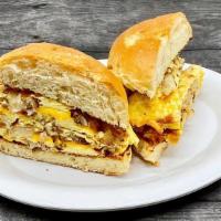 Latkes ‘N Eggs Breakfast Sandwich · Potato Latkes cooked in with our Scrambled Eggs, folded together with American Cheese throug...