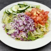 House Garden Salad · Mixed Lettuce, Tomatoes, Cucumbers, Onions and choice of Dressing