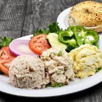 Deli Salad Appetizer | 3 Choices · Lettuce, Tomatoes, Cucumber, Onion, your choice of Bagel, and (3) large scoop of:  • All Whi...
