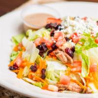 Lucky'S Chopped Salad · Chopped lettuce, candied pecans, dried cranberries, bleu cheese crumbles, diced tomatoes, sh...