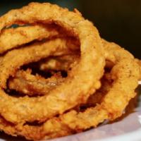 Onion Rings · Served with Lucky’s white BBQ.
