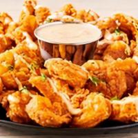 Bloomin' Fried Shrimp · Tender, bite-sized shrimp hand-breaded with our famous Bloomin’ Onion®spices and cooked unti...