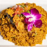 Arroz Con Mariscos · Arroz y mariscos en la salsa de la casa