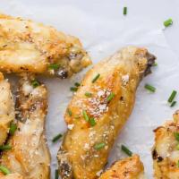 6 Pcs Classic Garlic Parmesan Wings · Six-piece chicken wings tossed in garlic Parmesan.Served with seasoned fries