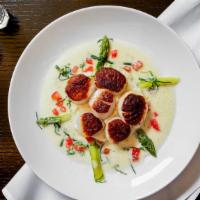 Maine Sea Scallops · Whipped potato and vegetable medley.
