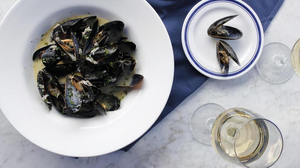 E.I Mussels Gilbert · Shallots, white wine, and cream.