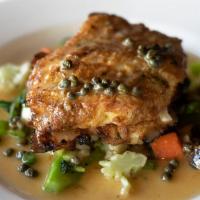 Chicken Francese Double Chicken Breast Sauteed · Lemon butter and English peas in rice pilaf.