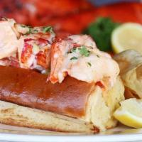 Jumbo Fresh Maine Lobster Roll · Butter toasted New England bun and Maryland fries.