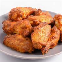 Hot’N Spicy Buffalo Chicken Wings · A full pound of oven-roasted chicken wings tossed in fiery buffalo sauce.