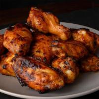 Bbq Chicken Wings (1 Lb) · A full pound of oven roasted chicken wings tossed in our tangy BBQ sauce.