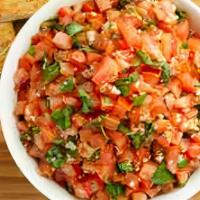 Bruschetta · Made from scratch, daily, with fresh tomatoes, garlic, basil and seasonings. Served with Bal...