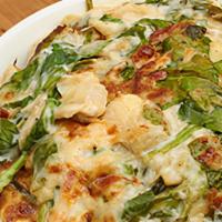 Spinach Artichoke Dip · Made daily in house with fresh spinach, artichoke hearts, a variety of cheeses including our...