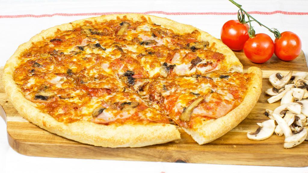 Canadian Classic Pizza · Smoked bacon, pepperoni, Canadian ham, mushrooms and Mozzarella cheese.