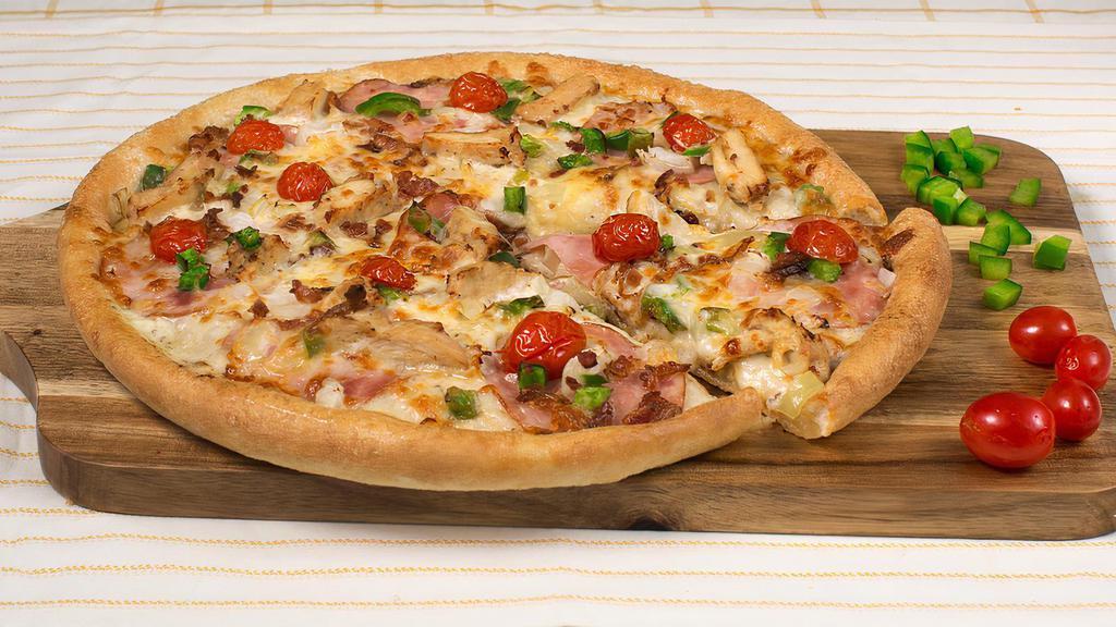 Ranch Style Chicken Pizza · Grilled chicken strips, Canadian and smoked bacon, fresh tomatoes, green peppers and onions, over ranch-style sauce, topped with Sarpino's gourmet cheese blend and sprinkled with sharp Parmesan cheese.