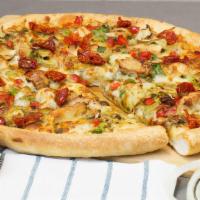 Pesto Lovers Pizza · Pesto sauce, grilled chicken strips, artichoke hearts, sun-dried tomatoes, onions, red and g...