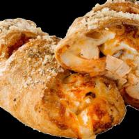 Buffalo Chicken Ranch Calzone · Chicken strips, Buffalo and ranch sauce, Parmesan and signature gourmet cheese blend.