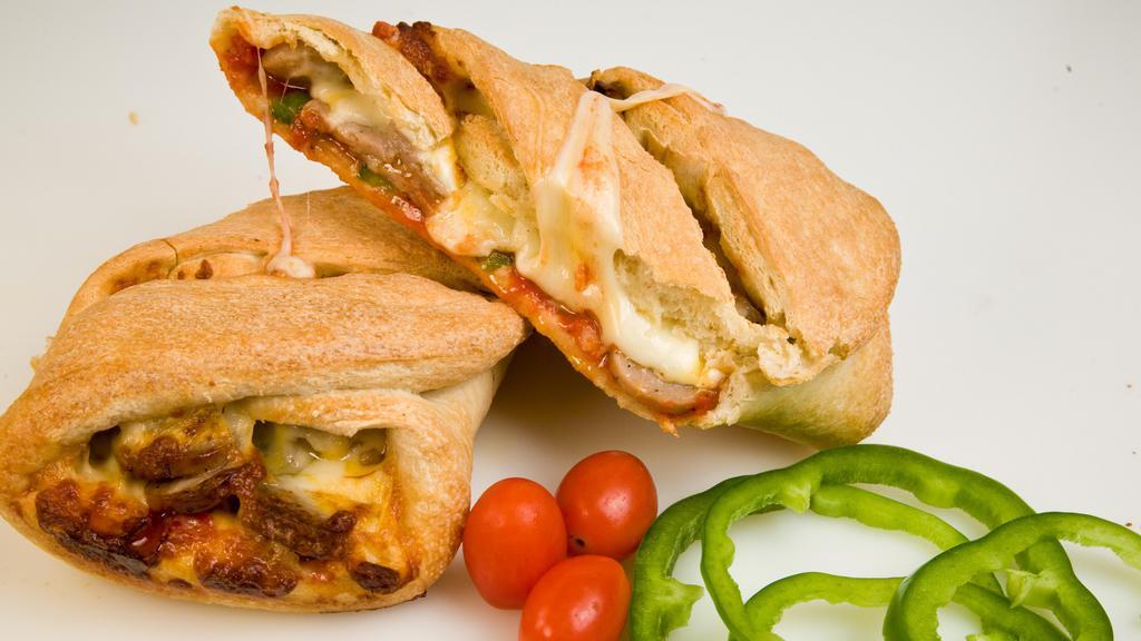 Sausage Supreme Calzone · Mild Italian sausage, meatballs, onions, red bell peppers, Sarpino's gourmet cheese blend and Sarpino's homemade tomato sauce.