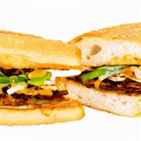 Sarpinos Steak Sandwich · Juicy sliced steak,sauteed onions and green peppers,fresh mushrooms,our signature gourmet ch...