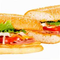 Ham & Cheese Sandwich · Canadian bacon, Sarpino's cheese mix, fresh onions, lettuce, tomatoes, mayonnaise and Dijon ...