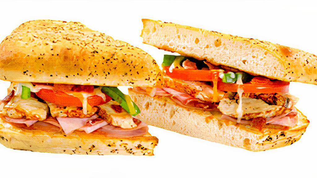 Country Ranch Sandwich · Chicken strips, Canadian bacon, crisp bacon, fresh tomatoes, green peppers, ranch dressing, Sarpino's gourmet cheese blend and sharp Parmesan cheese. Served with potato chips.