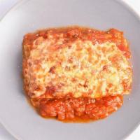 Baked Lasagna · Baked with your choice of meat,tomato vegetarian or creamy Alfredo sauce,and topped with Par...
