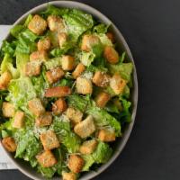 Caesar Salad · With romaine lettuce, Parmesan cheese and croutons.